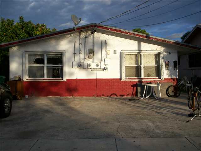 106 NW 12TH AV