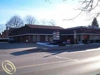 206 E GRAND RIVER AVE