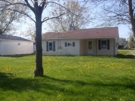100 E First St