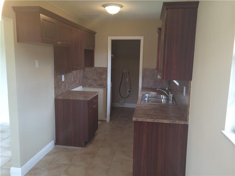 8795 NW 23 AV