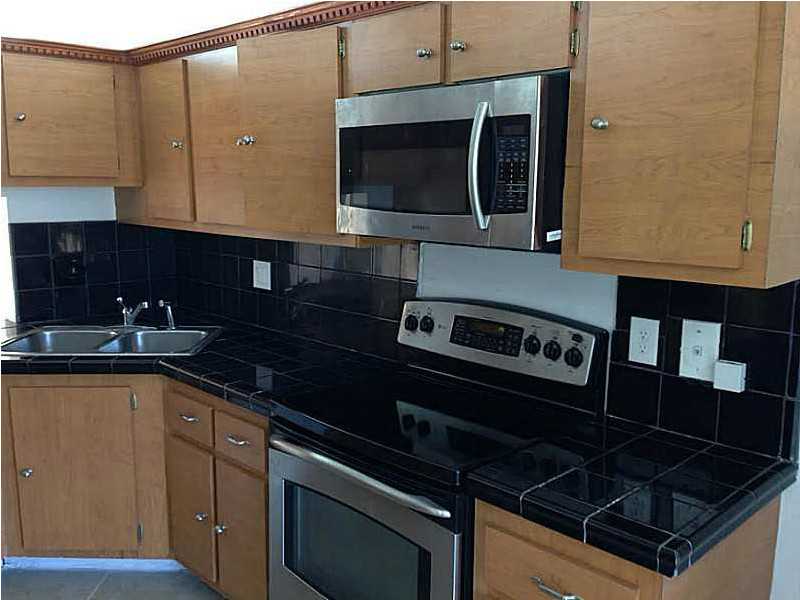430 NW 214 ST # 205