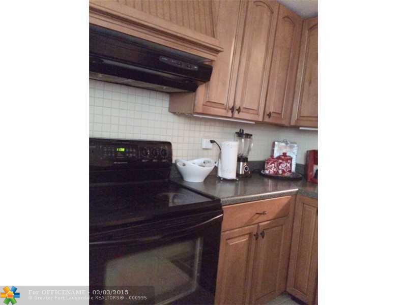 5495 NW 10th Ct # 104